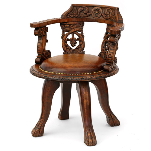 Heavily Carved Oak Ship's Chair with Inset Leather Seat