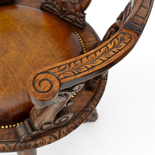 Heavily Carved Oak Ship's Chair with Inset Leather Seat