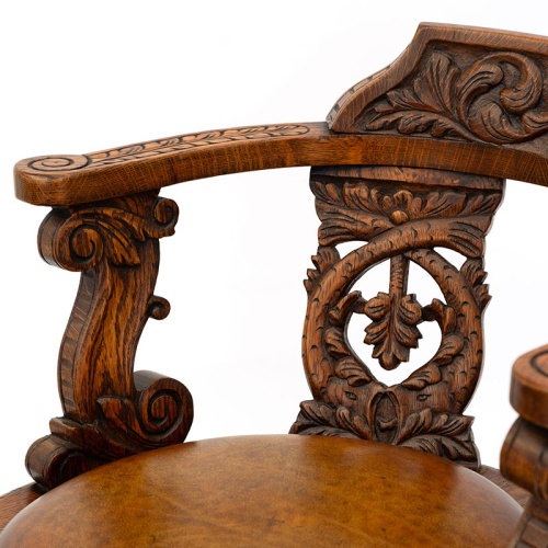 Heavily Carved Oak Ship's Chair with Inset Leather Seat