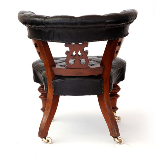 Antique Heavily Carved Walnut Library Chair with Original Leather Covering